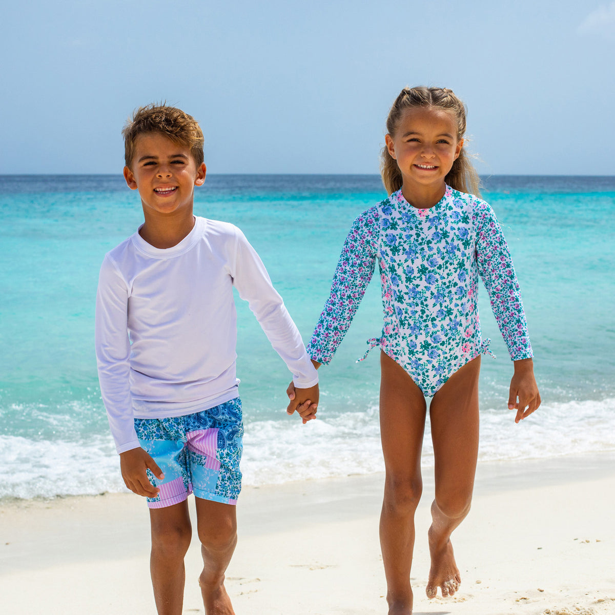 Family Swimwear at beach featuring Shade Critters Floral Patchwork Boys 4 way Stretch Swim Trunk
