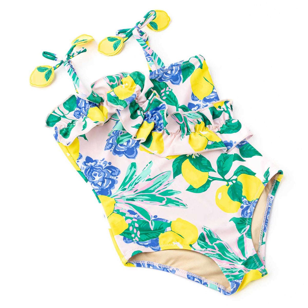 Girls citrus print one piece swimsuit with ruffle straps and vibrant lemon floral pattern, stylish kids swimwear.