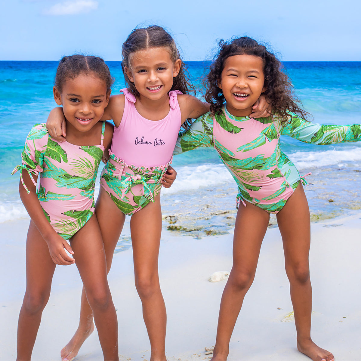 Lifestyle Image of Cabana Palms Girls Shimmer Puff Sleeve Cut Out One Piece Swimsuit 4-14