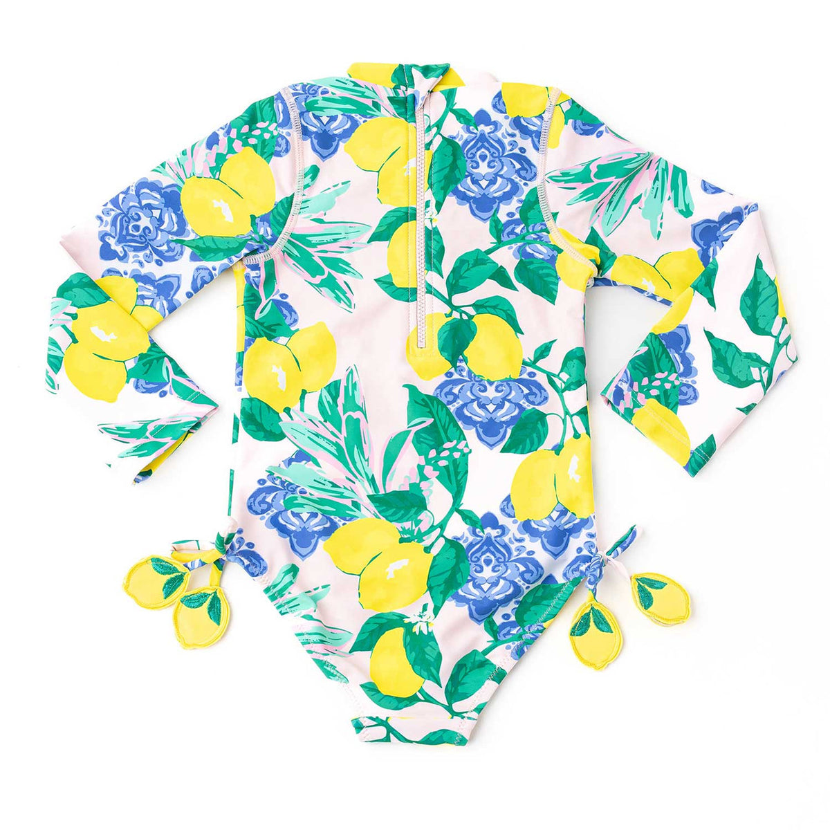 Girls citrus print long sleeve one piece swimsuit with full coverage design and tassel accents, comfortable kids swimwear for sun protection.