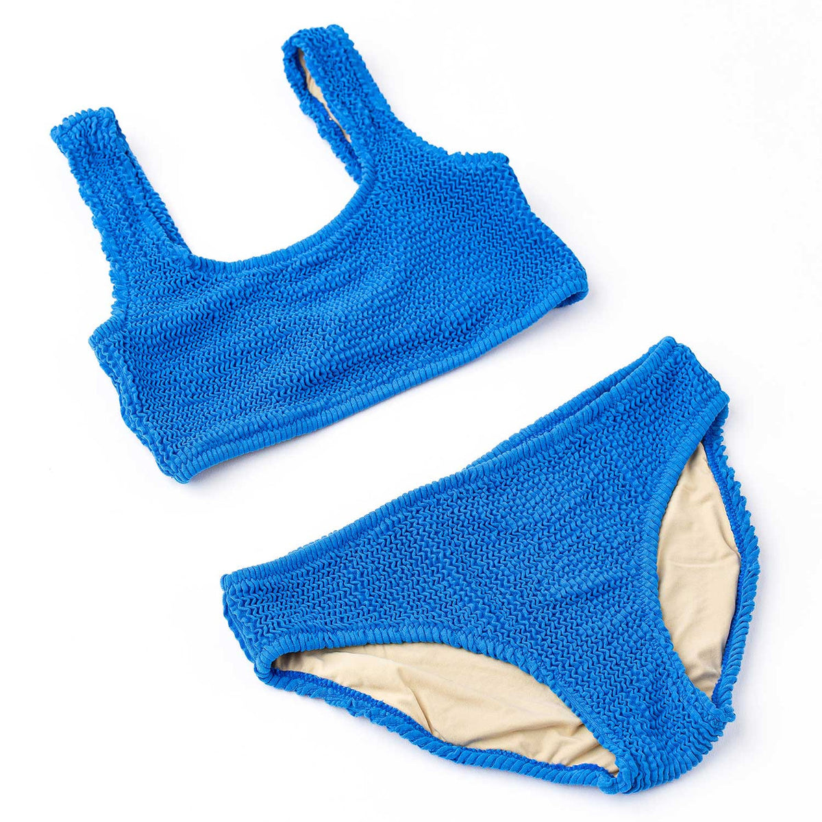 Girls cobalt blue crinkle bikini with textured stretch fabric and classic two piece swimsuit design, stylish kids swimwear.