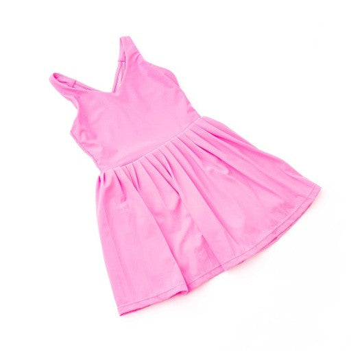 Back view of the Shade Critters dress featuring crisscross straps and clean pleats.