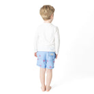 Back view of boys Octopus Icon swim trunks on model showing fit and length.