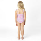 Girls floral one piece swimsuit with smocked fit and tie straps, comfortable kids swimwear from back view.