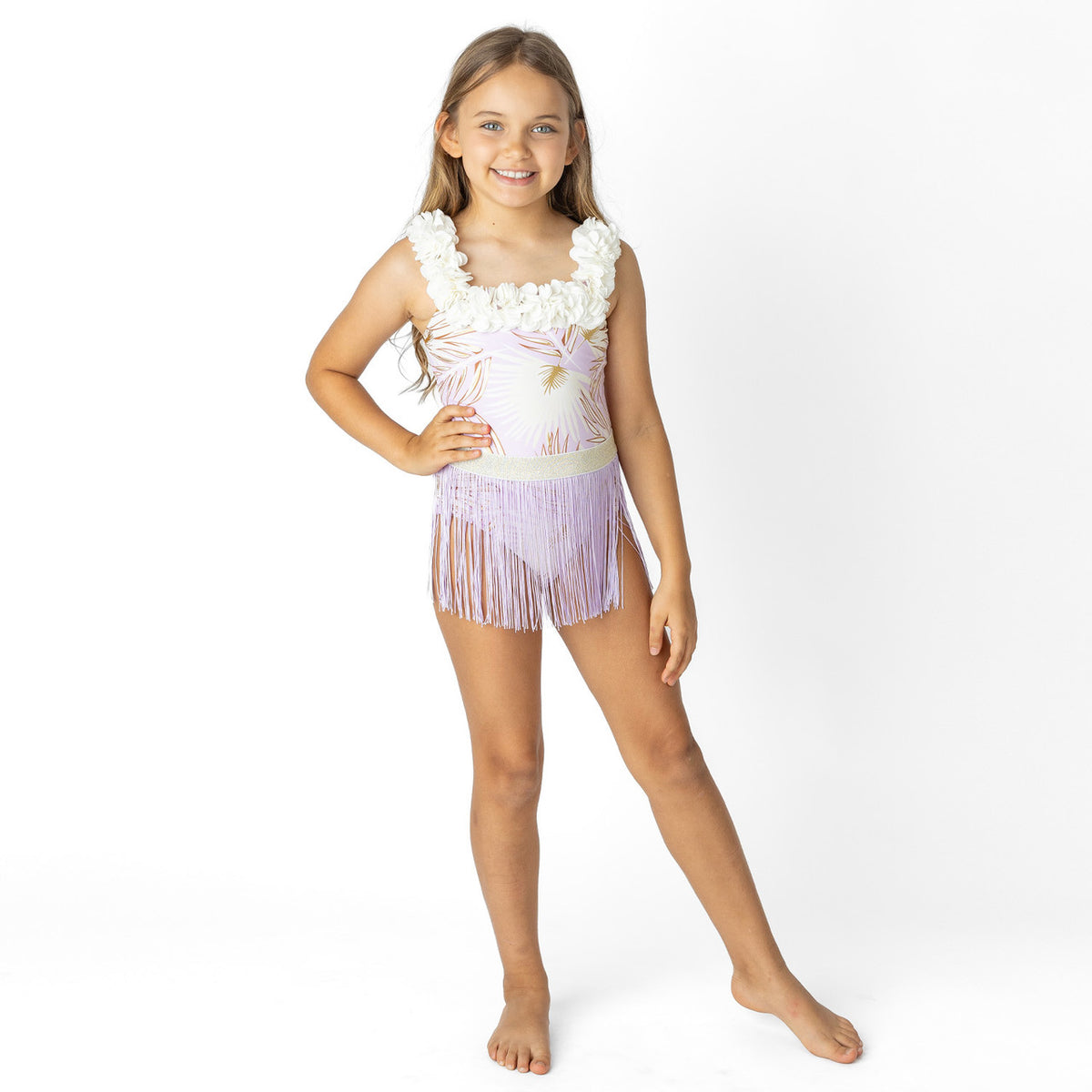Girls Purple Metallic Hula Girl one piece swimsuit on model showing fit.