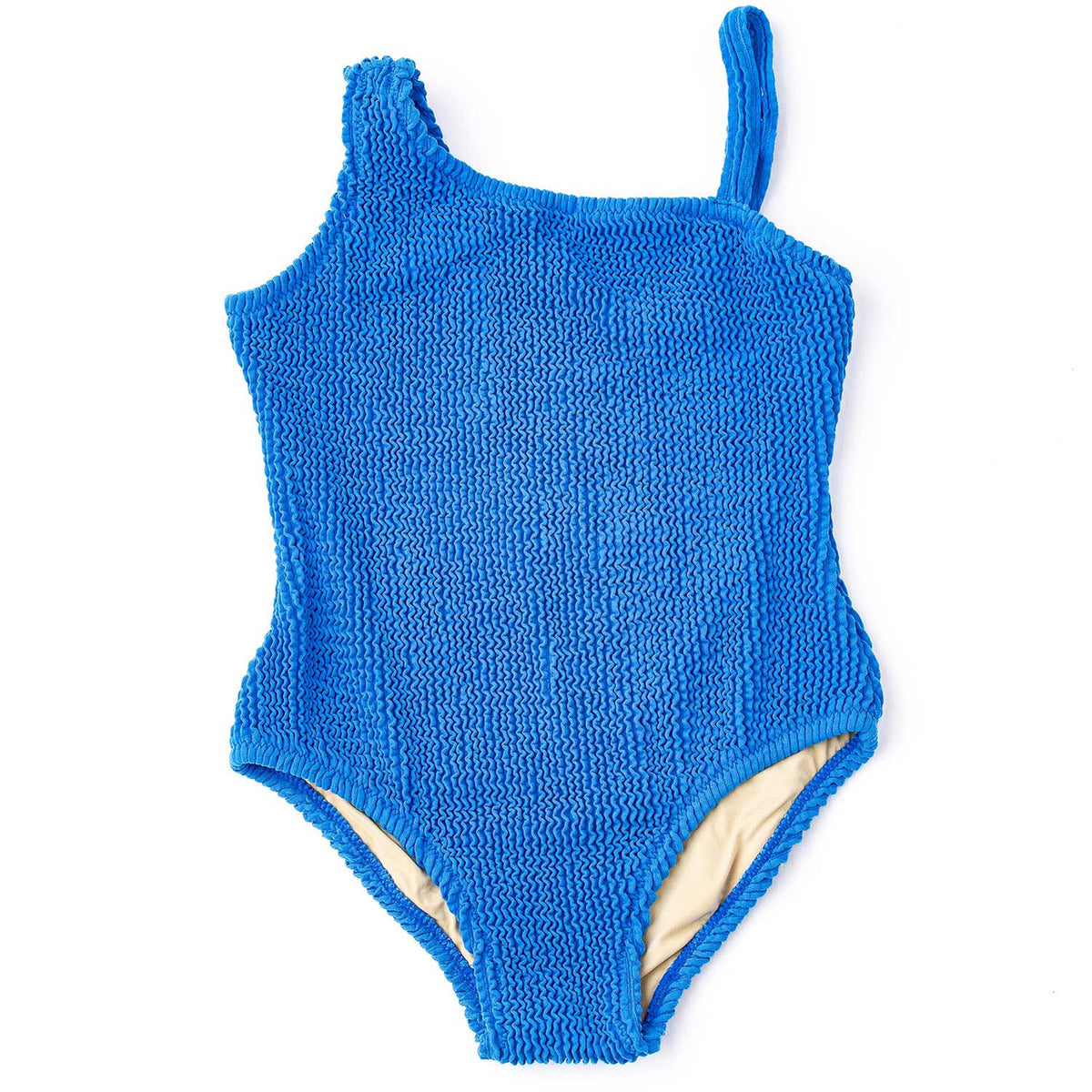 Shade Critters girls one shoulder one piece swimsuit in cobalt blue crinkle fabric, textured kids swimwear with modern asymmetrical design.