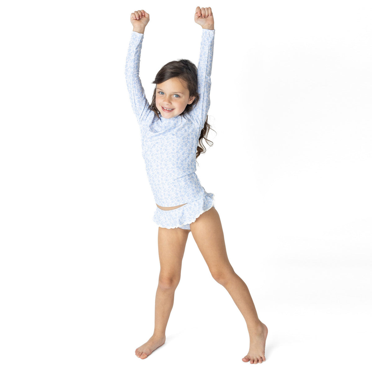 Shade Critters girls rashguard swim set in coastal gardens floral print, long sleeve kids swimwear shown on model.