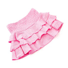 Girls pink eyelet ruffle skirt with smocked waistband and layered tiers, cute kids swim cover up.