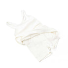 Girls white athletic dress with built-in shorts and flexible fit, functional kids activewear.