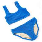 Girls cobalt blue crinkle bikini with textured stretch fabric and classic two piece swimsuit design, stylish kids swimwear.