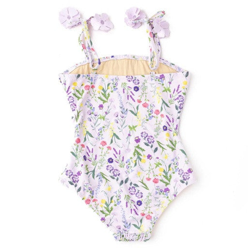 Back view of the Shade Critters swimsuit displaying the full wildflower pattern and soft stretch lining.