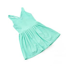 Shade Critters Green Girls Pleated Active Dress  full front view with the skirt neatly spread to show the pleating. 