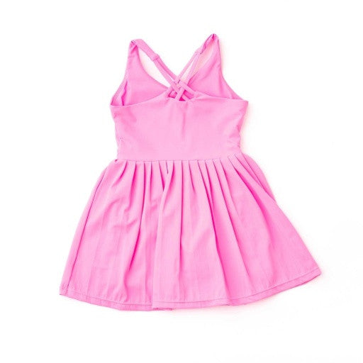 Full front shot of the Shade Critters dress highlighting its bright color and athletic silhouette.