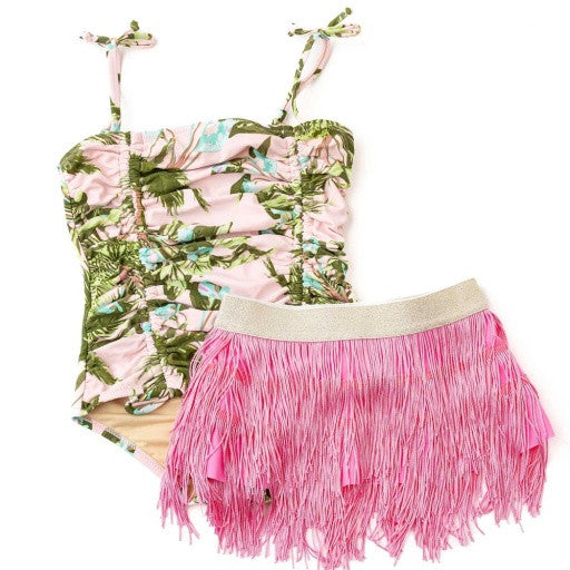 Shade Critters Girls tropical print one piece swimsuit with bright pink fringe skirt laid flat.