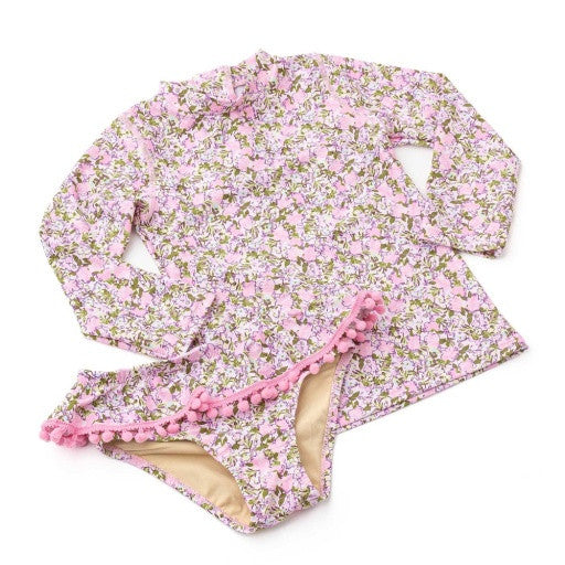Front layout of the Shade Critters Blushing Blooms Girls Rashguard Swim Set featuring the soft pink florals and playful ruffle trim.
